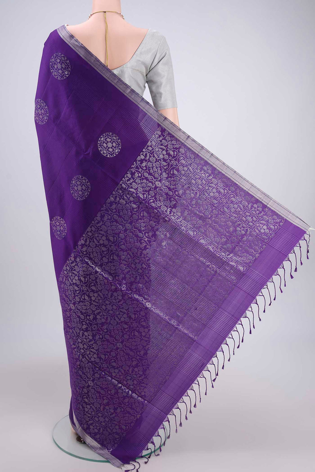 Flat view of Purple Soft Silk Saree with Zari Butta on the body and Zari Border. 