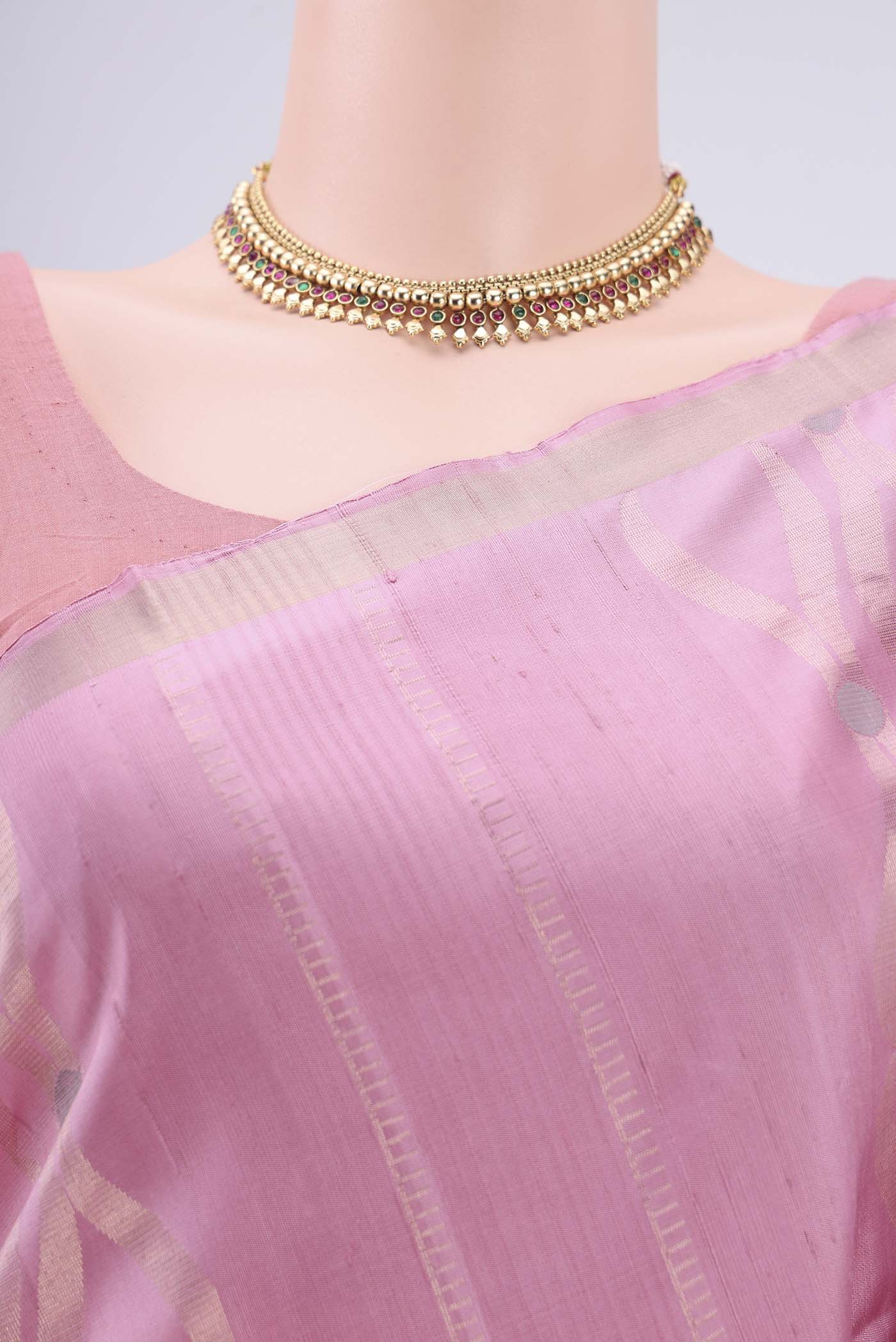 Border image of Rose pink Baluchari Silk Saree with Zari Brocade on the body and Zari Border. 