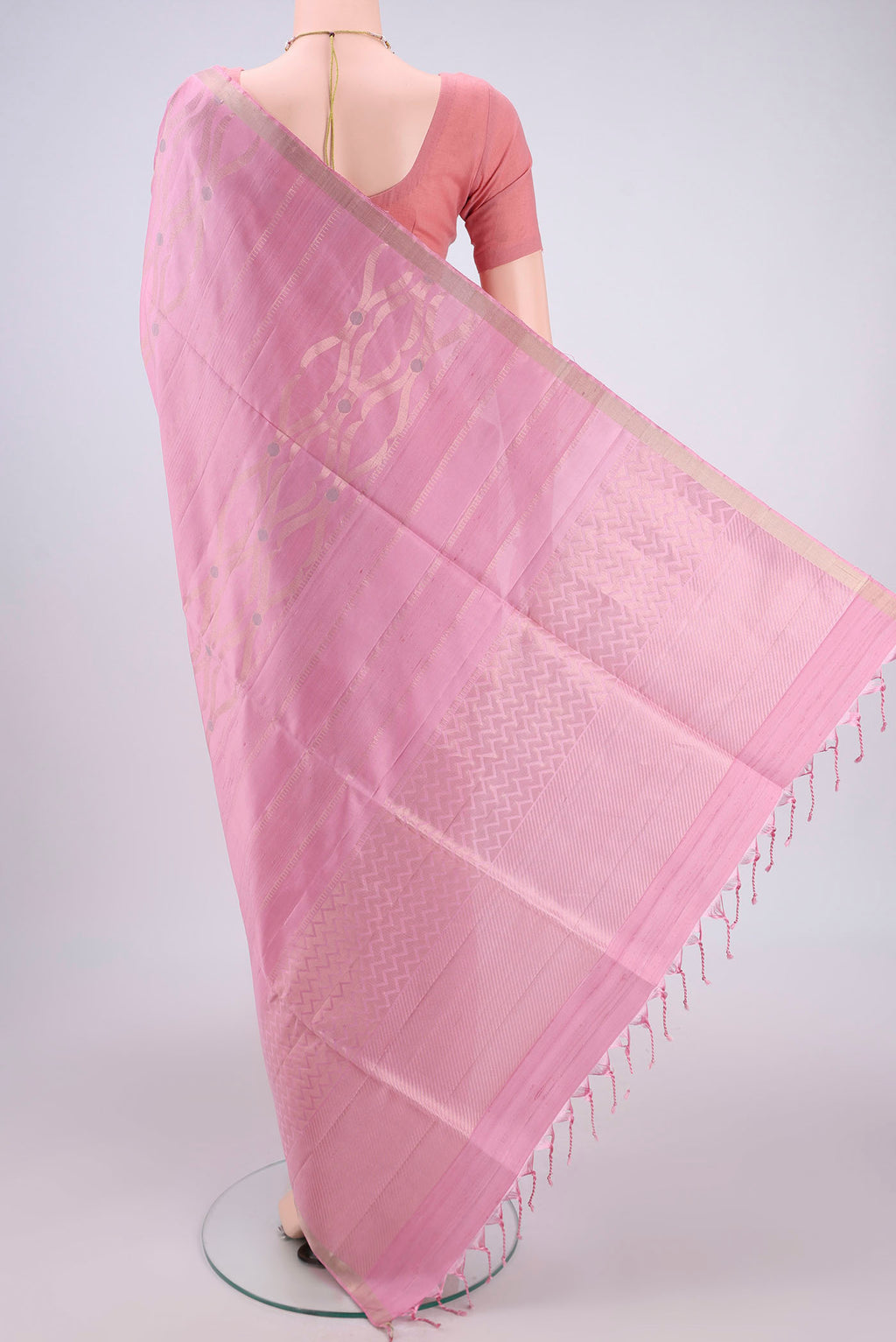 Flat view of Rose pink Baluchari Silk Saree with Zari Brocade on the body and Zari Border. 