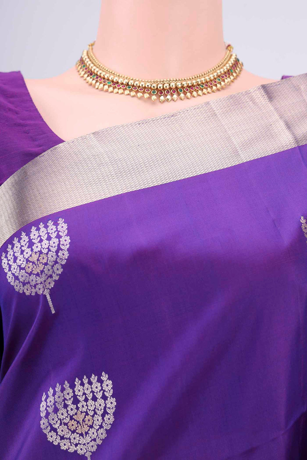 Border image of Purple Dual Tone Baluchari Silk Saree with Zari Butta on the body and Zari Border. 