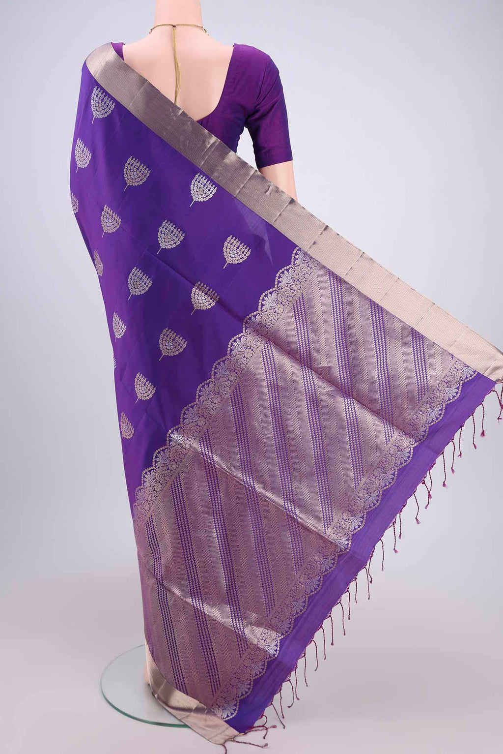 Flat view of Purple Dual Tone Baluchari Silk Saree with Zari Butta on the body and Zari Border. 