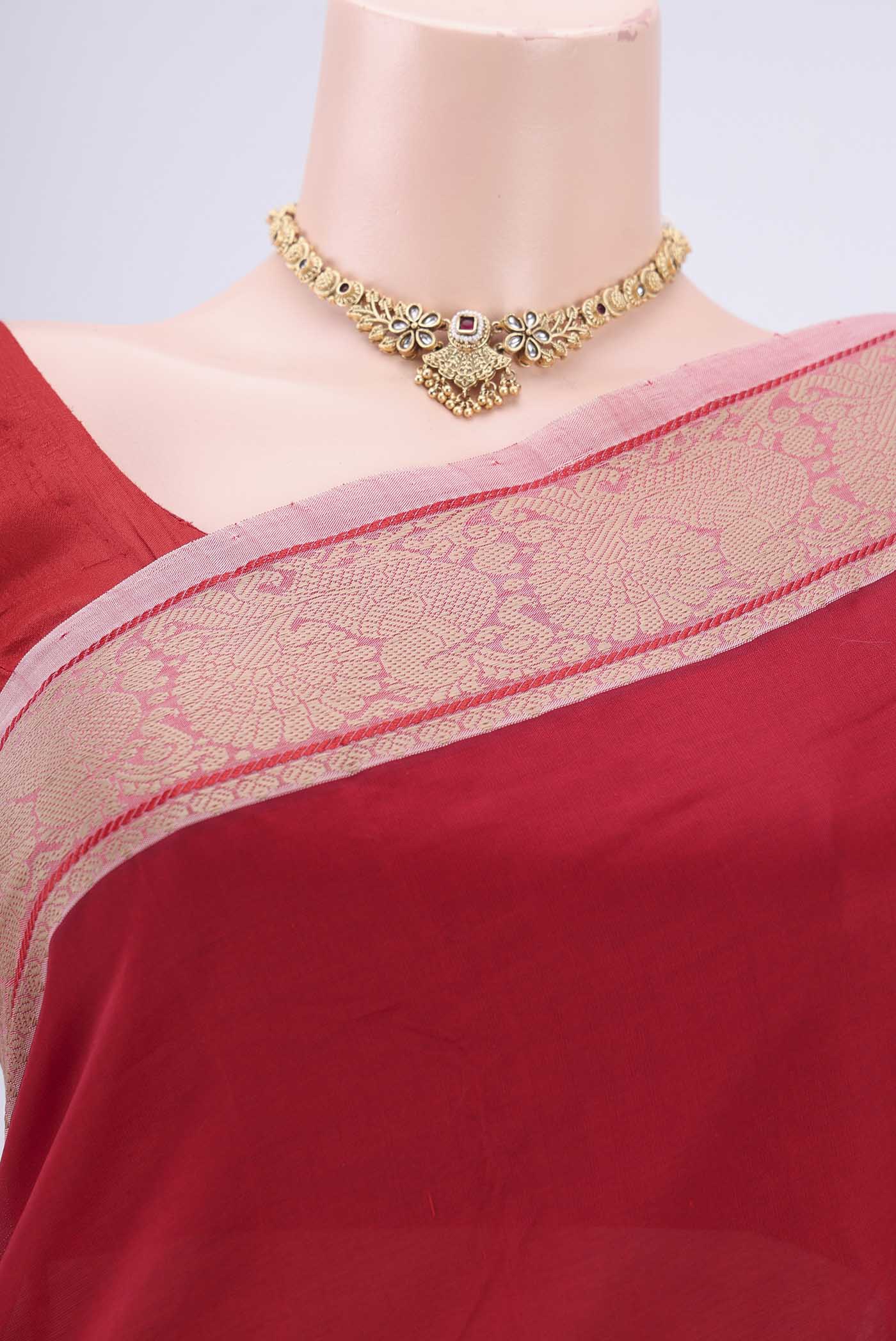 Border image of Red Blended Poly Cotton Saree with Plain Body and Thread Border. 