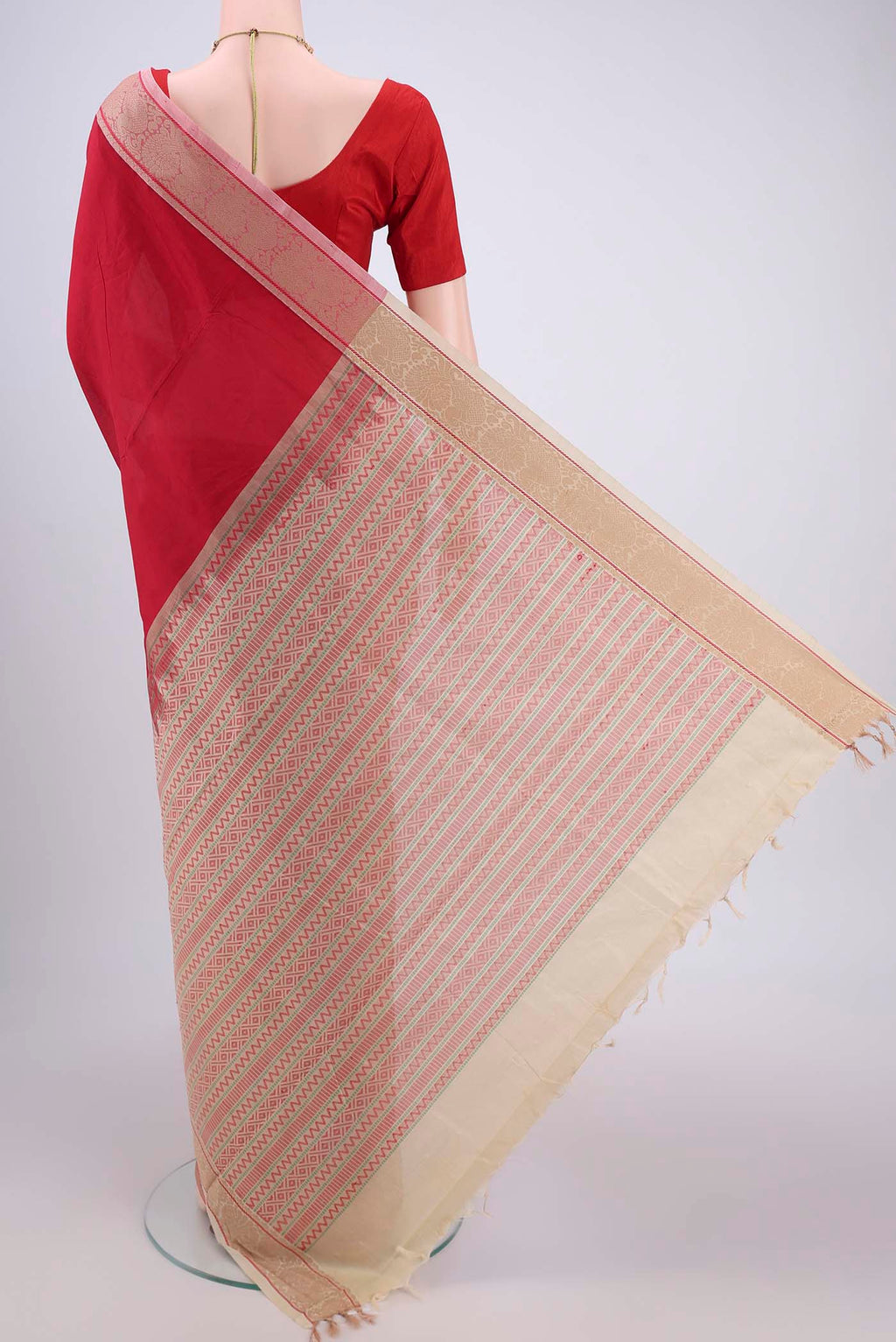 Flat view of Red Blended Poly Cotton Saree with Plain Body and Thread Border. 