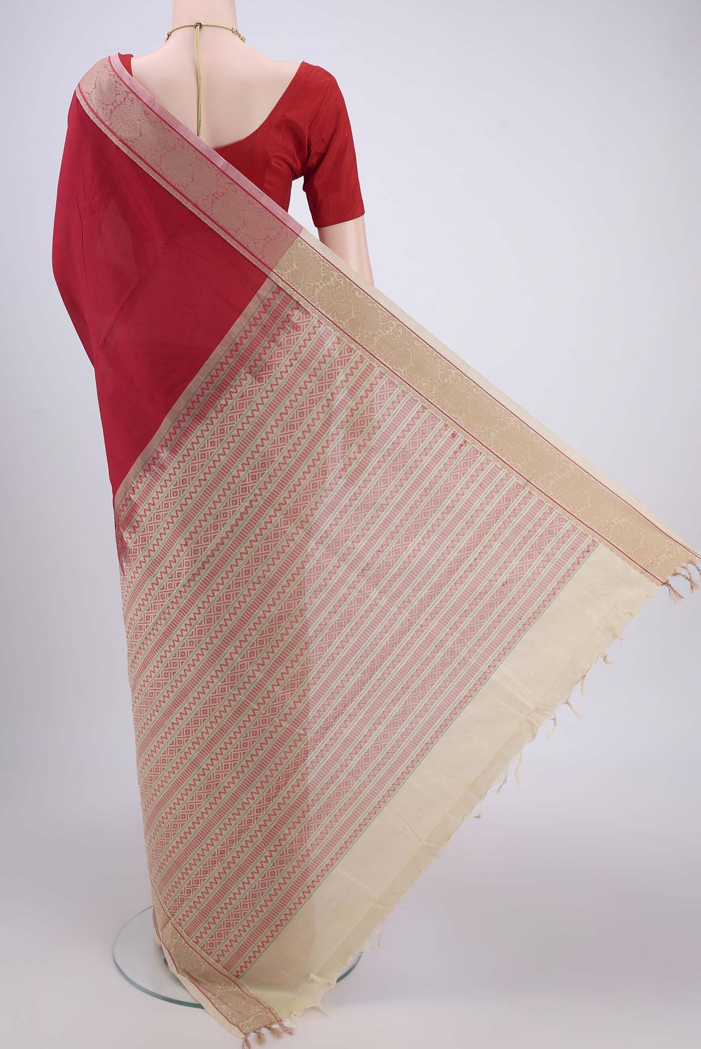Flat view of Red Blended Poly Cotton Saree with Plain Body and Thread Border. 