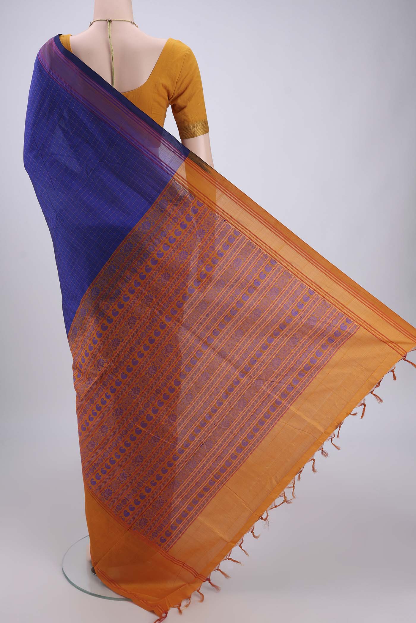 Flat view of Royal Blue Blended Poly Cotton Saree with Checked design on the body and Thread Border. 