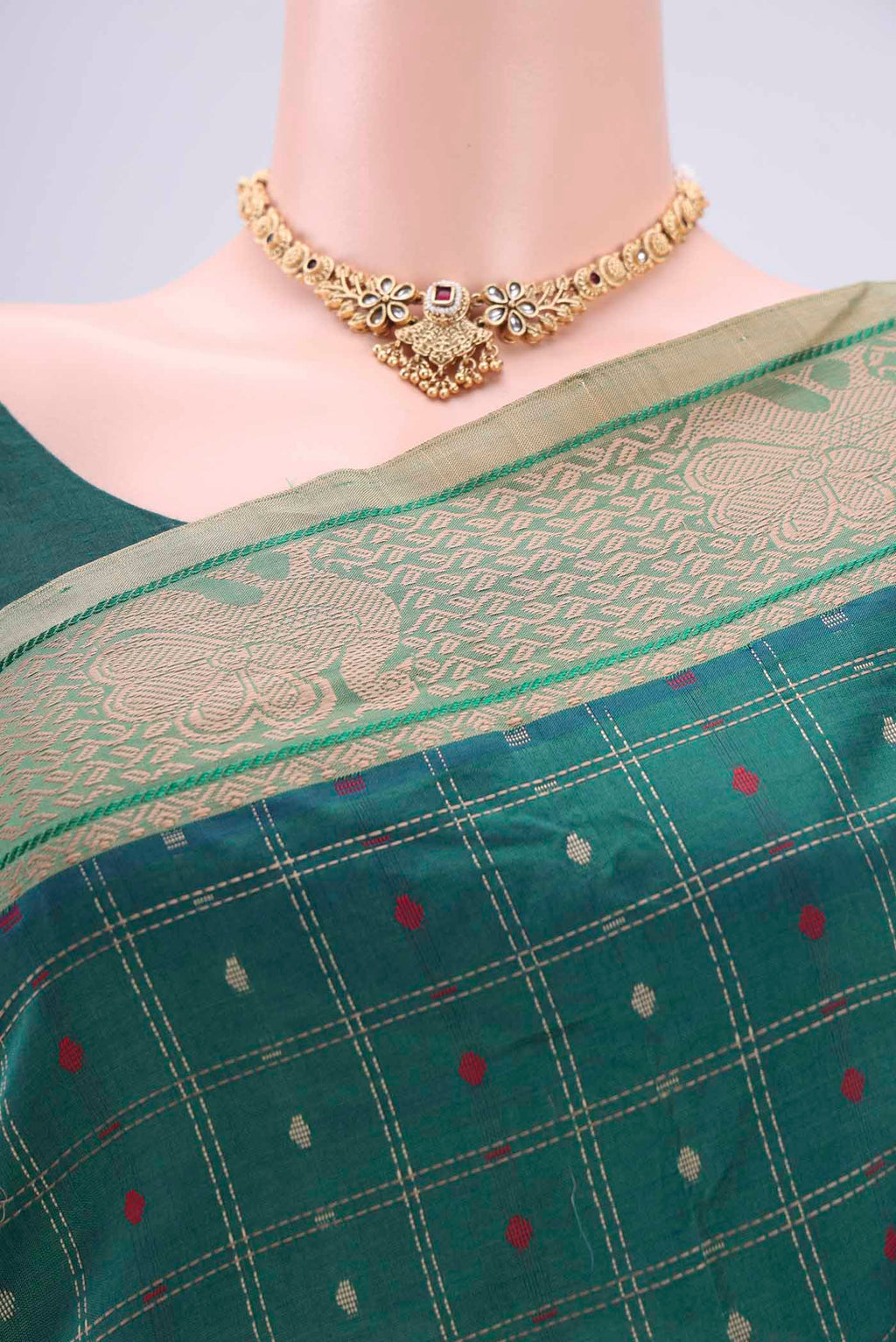 Border image of Green Blended Poly Cotton Saree with Checked design on the body and Thread Border. 