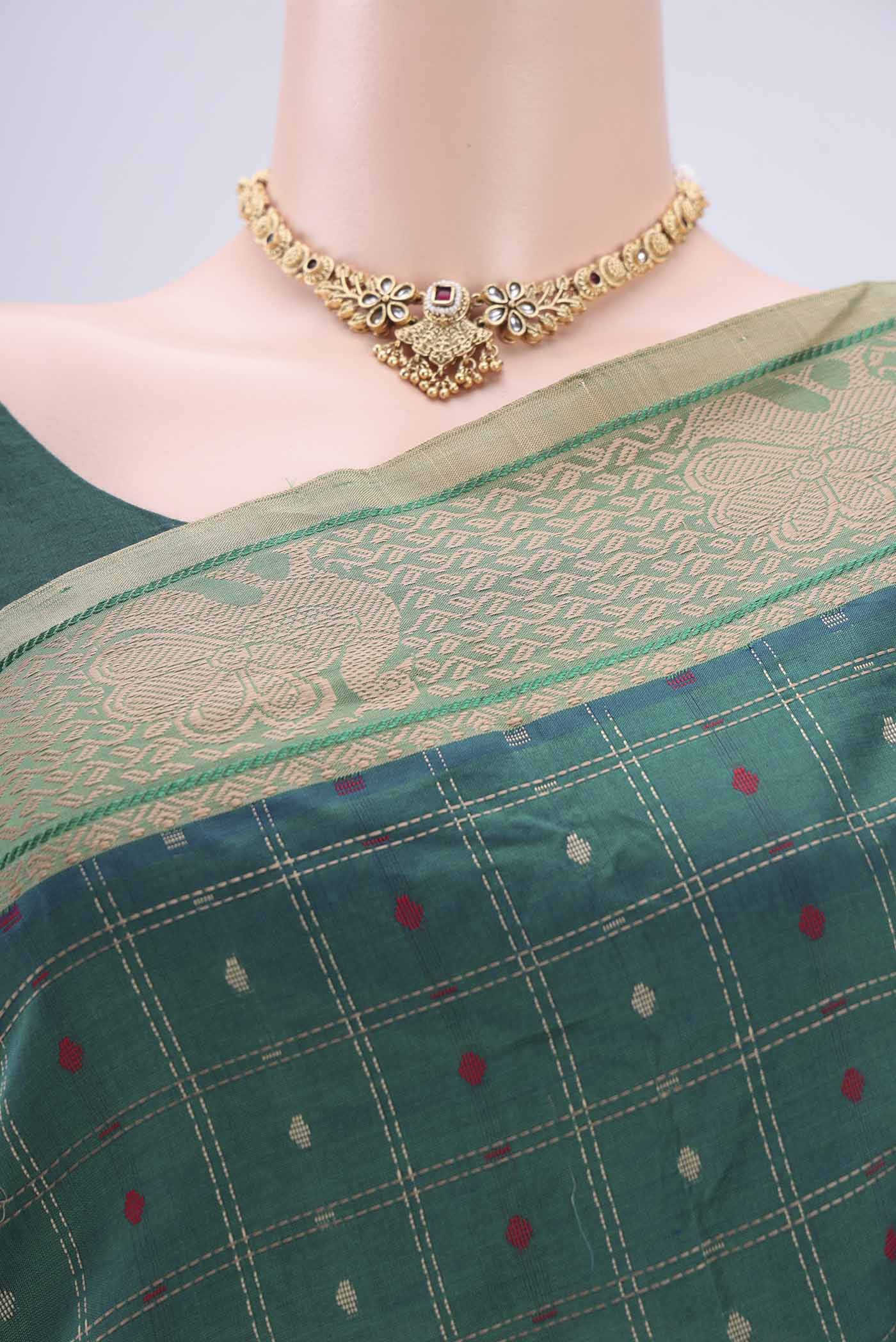Border image of Green Blended Poly Cotton Saree with Checked design on the body and Thread Border. 