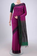 Magenta Blended Poly Cotton Saree with Checked design on the body and Thread Border.  displayed on a mannequin