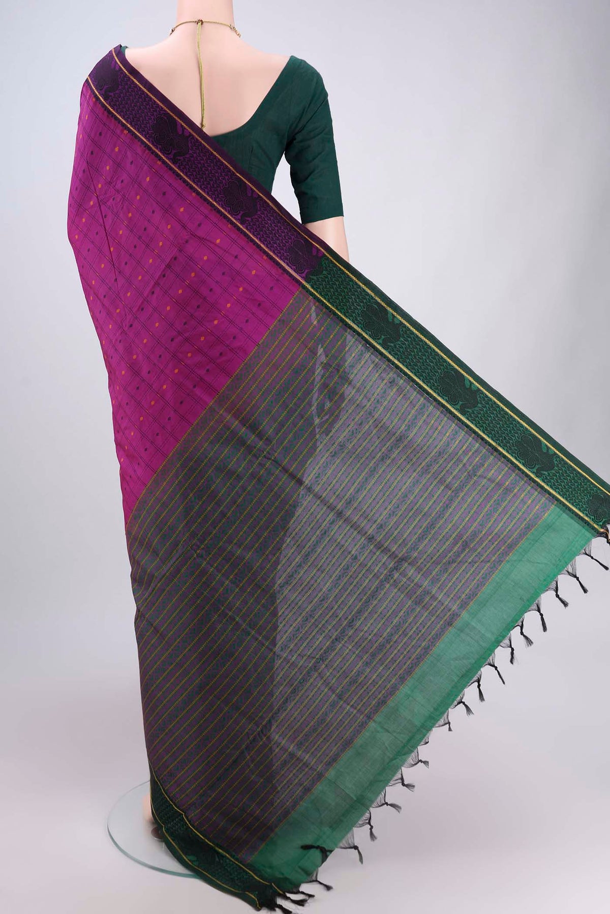 Flat view of Magenta Blended Poly Cotton Saree with Checked design on the body and Thread Border. 