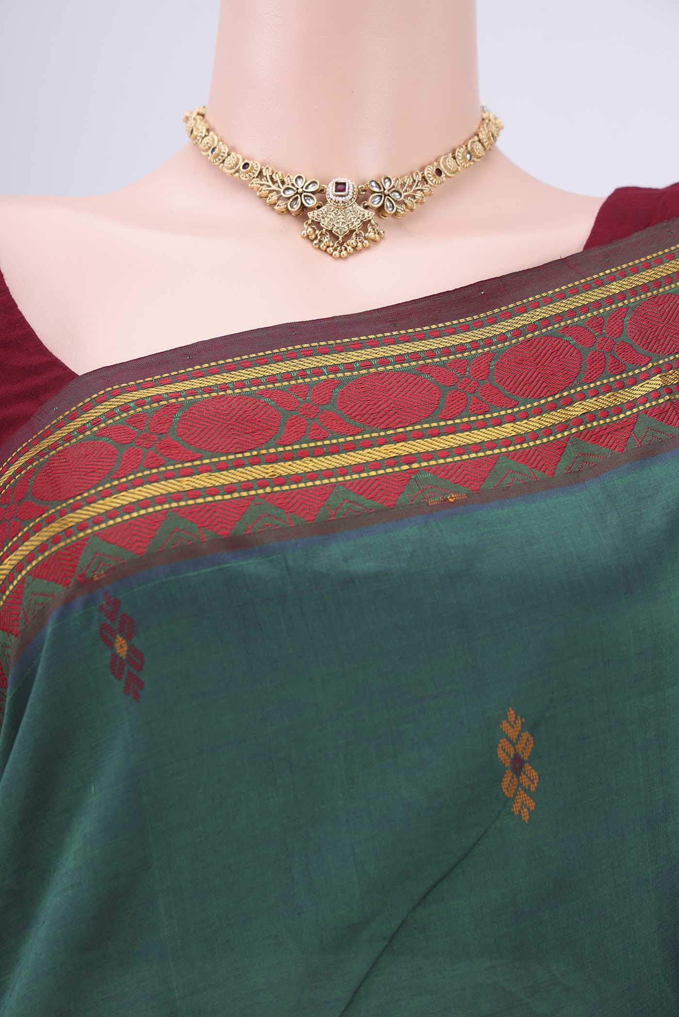 Border image of Bottle Green Blended Poly Cotton Saree with Thread Butta on the body and Thread Border. 