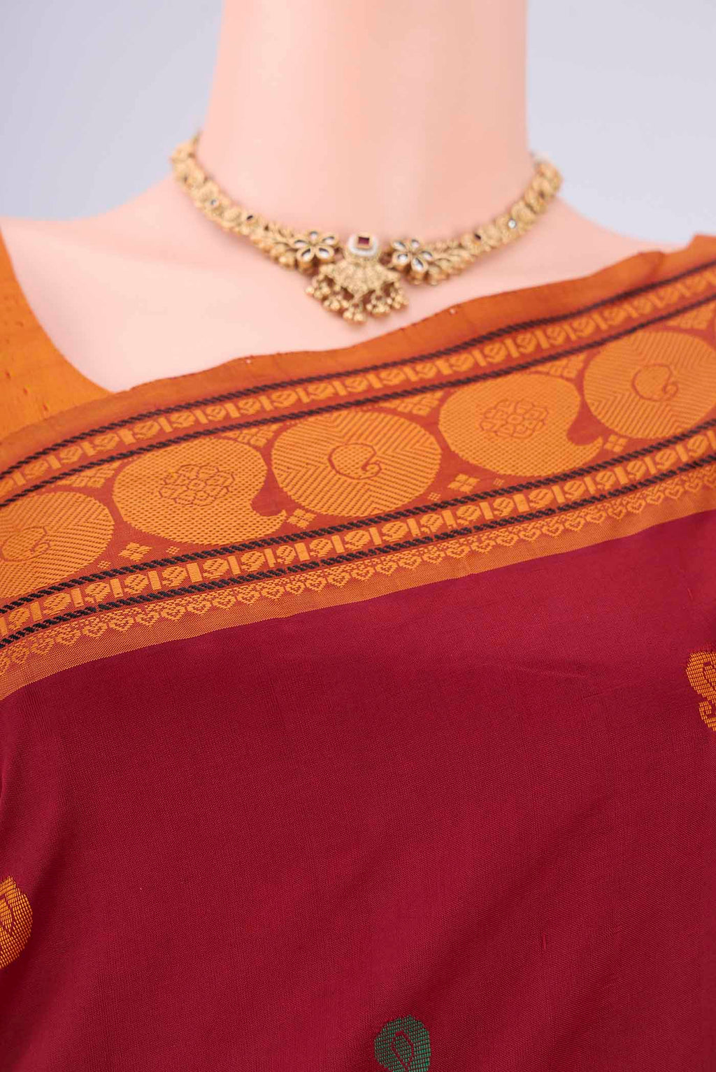 Border image of Maroon Blended Poly Cotton Saree with Thread Butta on the body and Thread Border. 