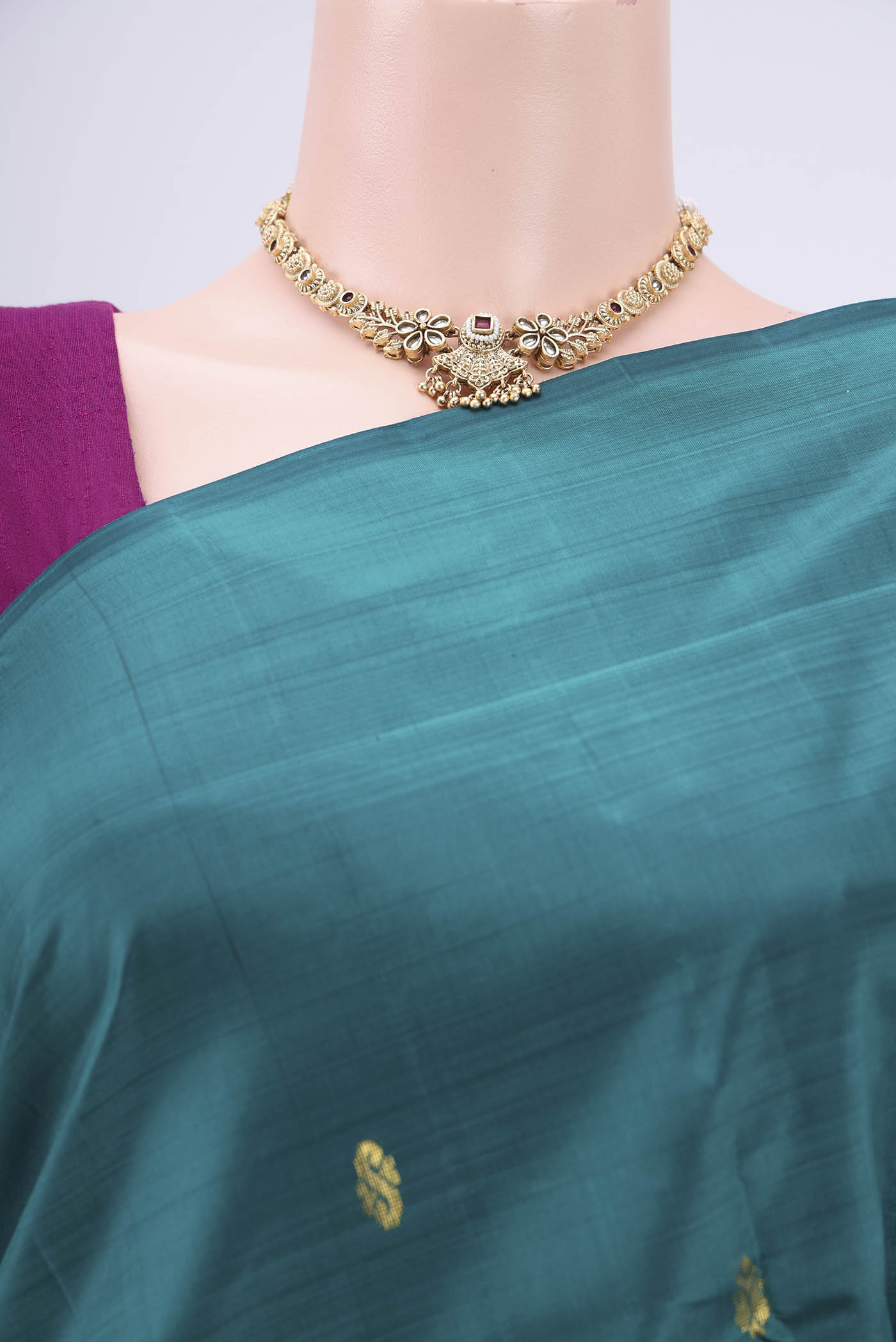 Border image of Peacock Blue Kanchipuram Silk Saree with Zari Butta on the body and One Side Border. 