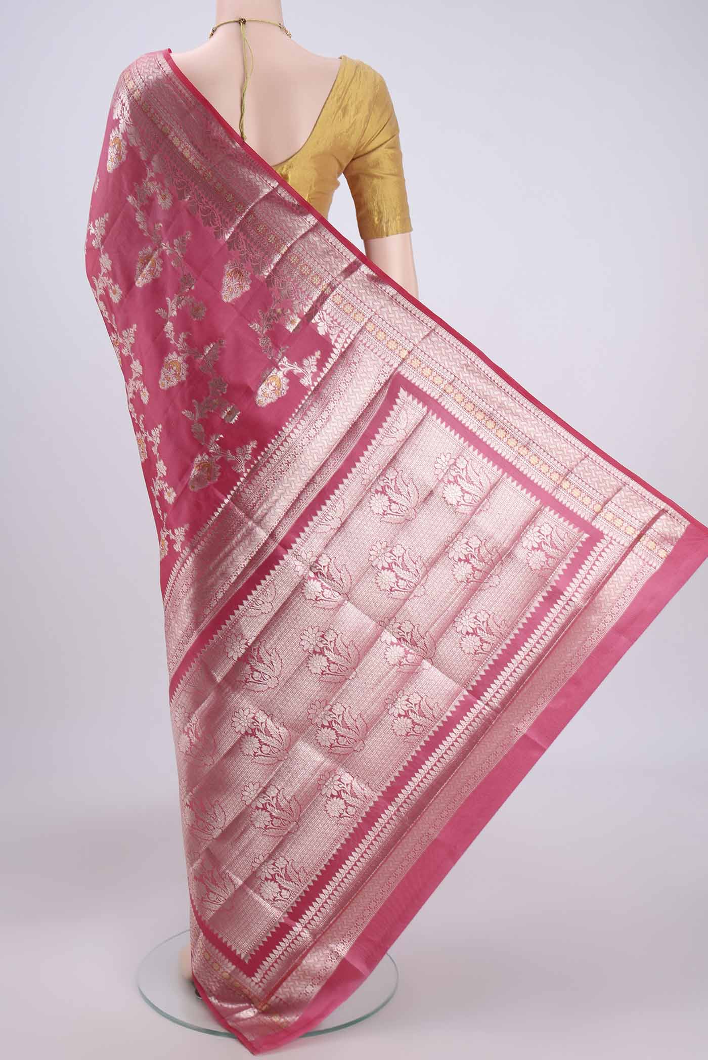 Flat view of Pink Banarasi Raw Silk Saree with Zari Brocade on the body and Zari Border. 