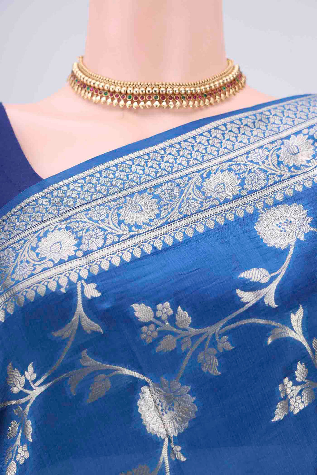 Border image of Blue Banarasi Raw Silk Saree with Zari Butta on the body and Zari Border. 
