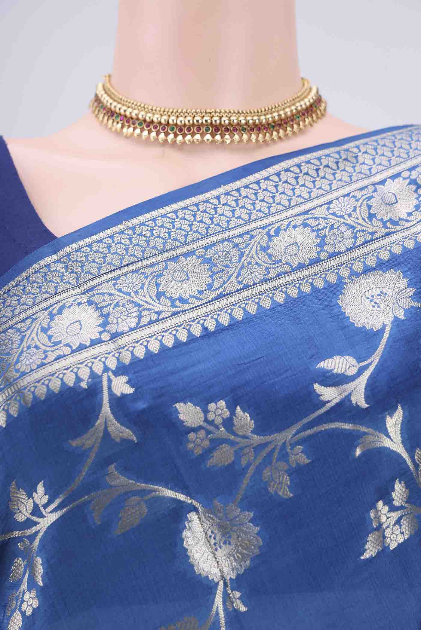 Border image of Blue Banarasi Raw Silk Saree with Zari Butta on the body and Zari Border. 