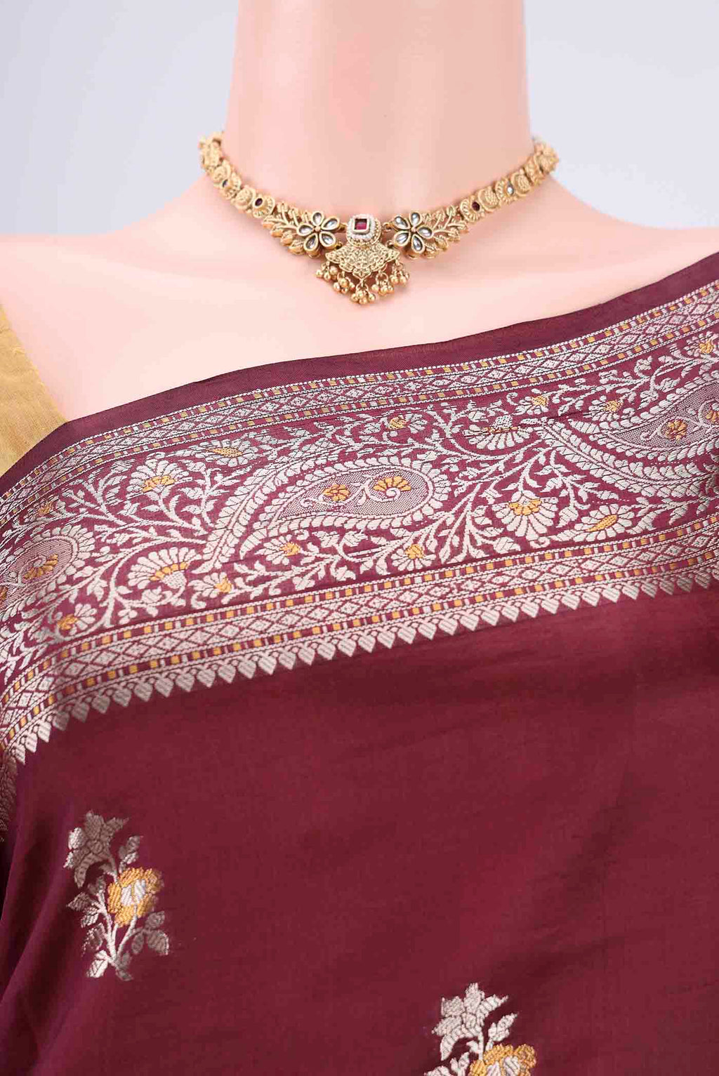 Border image of Burgundy Banarasi Raw Silk Saree with Zari Brocade on the body and Zari Border. 