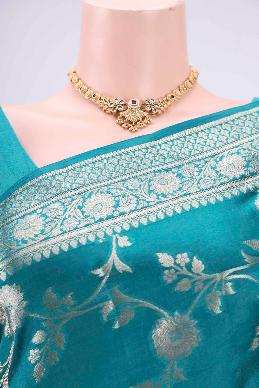 Border image of Peacock Blue Banarasi Raw Silk Saree with Zari Brocade on the body and Zari Border. 