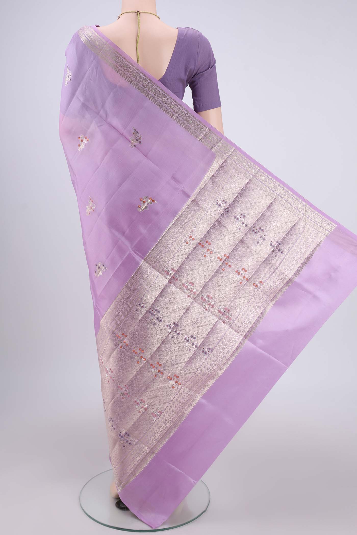 Flat view of Pink Banarasi Raw Silk Saree with Zari Butta on the body and Zari Border. 