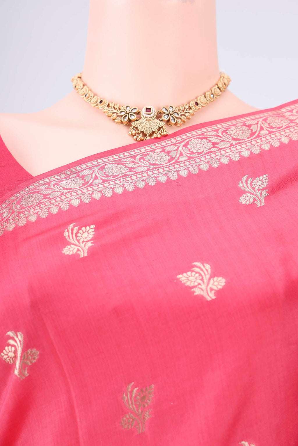 Border image of Peach Banarasi Raw Silk Saree with Zari Butta on the body and Zari Border. 