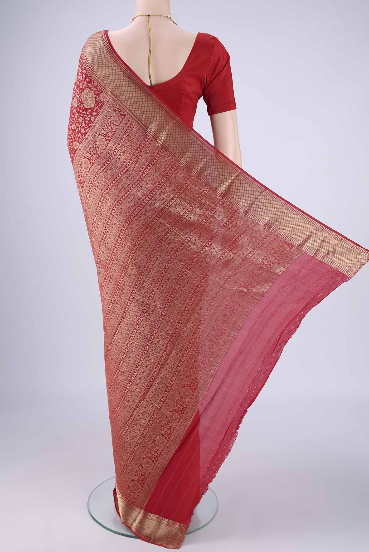 Flat view of Red Mysore Crepe Saree with Zari Brocade on the body and Zari Border. 