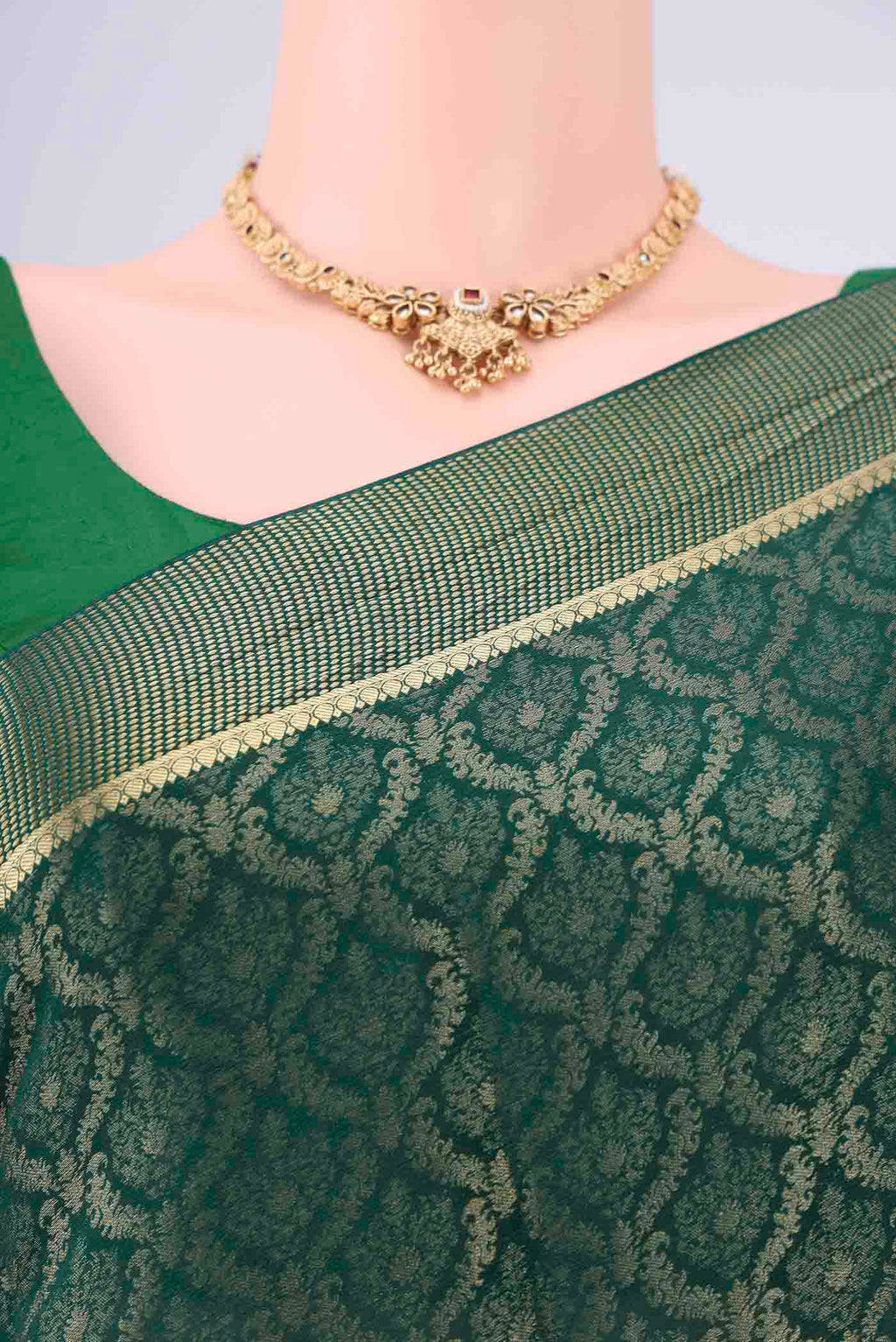 Border image of Bottle Green Mysore Crepe Saree with Zari Brocade on the body and Zari Border. 