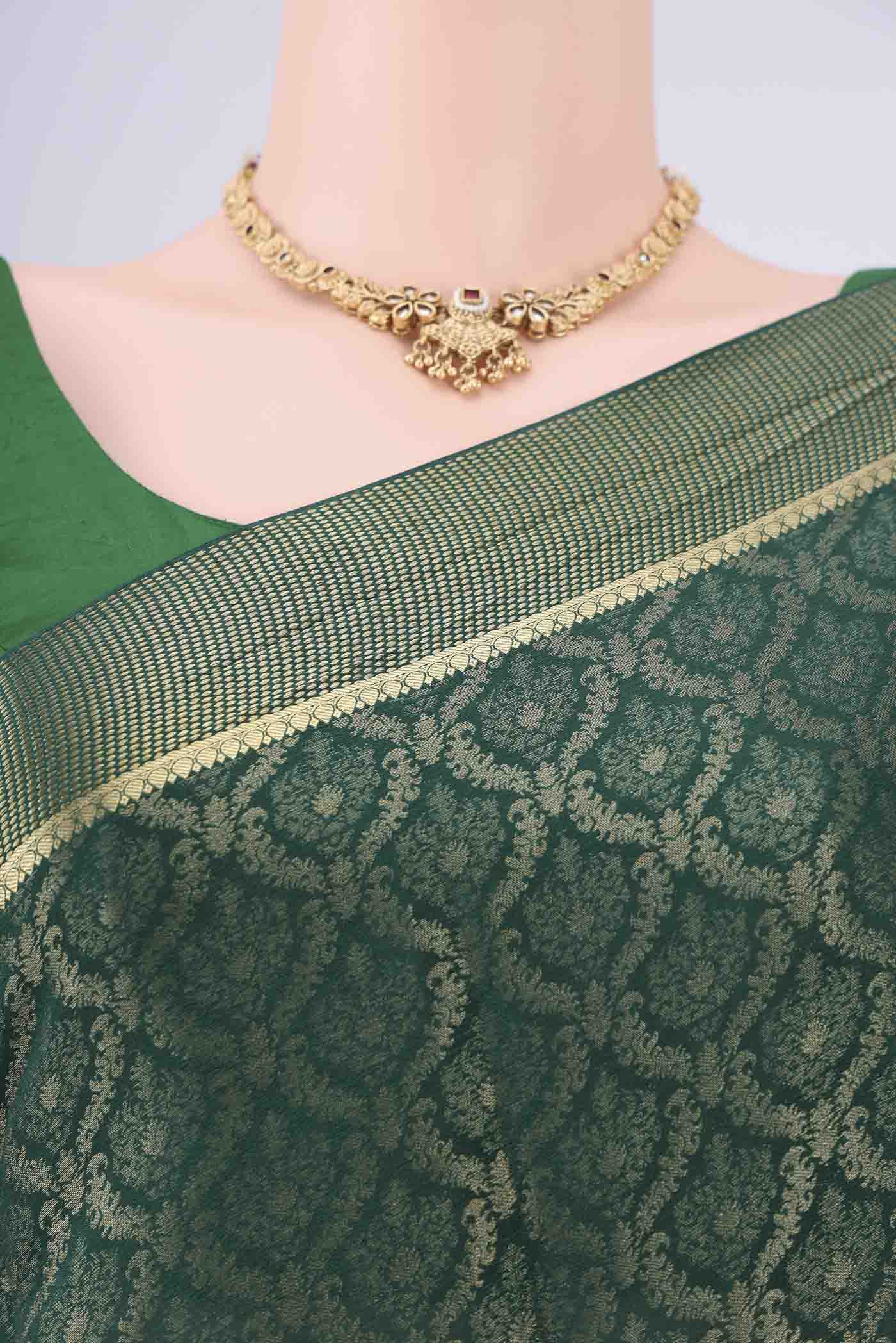 Border image of Bottle Green Mysore Crepe Saree with Zari Brocade on the body and Zari Border. 