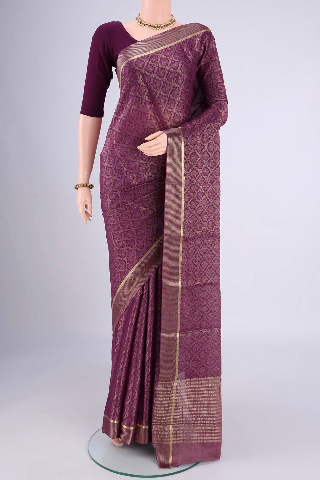 Purple Mysore Crepe Saree with Zari Brocade on the body and Zari Border.  displayed on a mannequin
