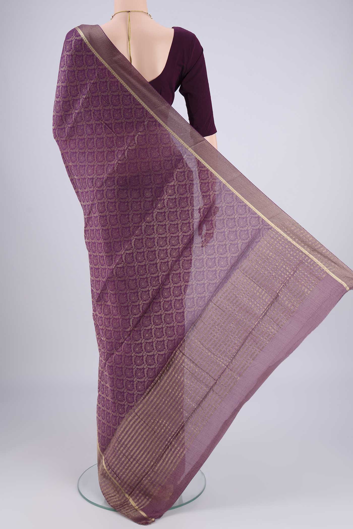 Flat view of Purple Mysore Crepe Saree with Zari Brocade on the body and Zari Border. 