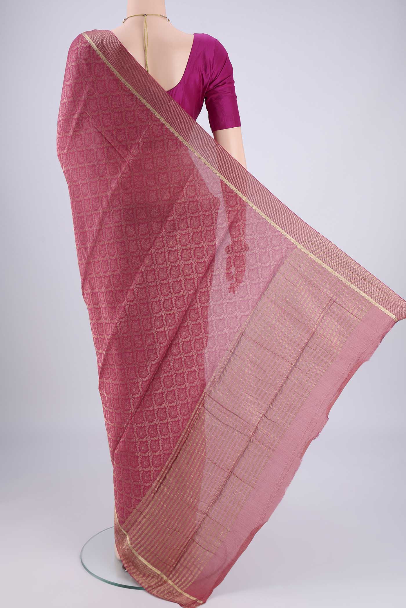 Flat view of Pink Mysore Crepe Saree with Zari Brocade on the body and Zari Border. 
