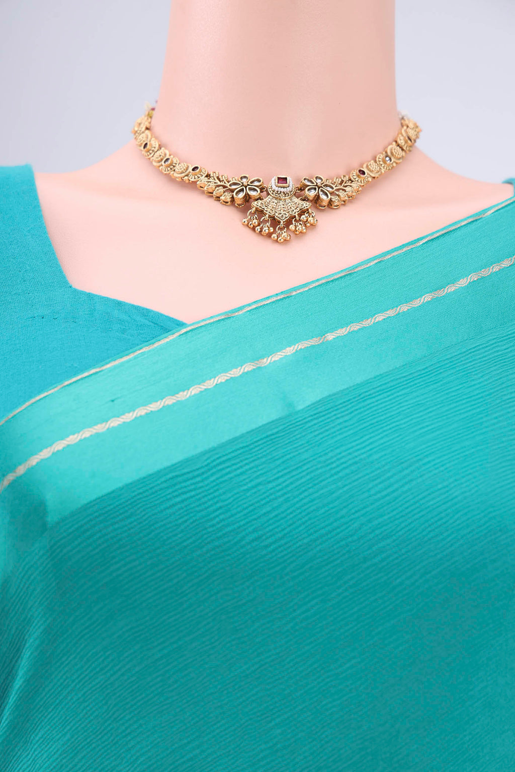 Border image of Turquoise Mysore Chiffon Saree with Plain Body and Satin Border. 