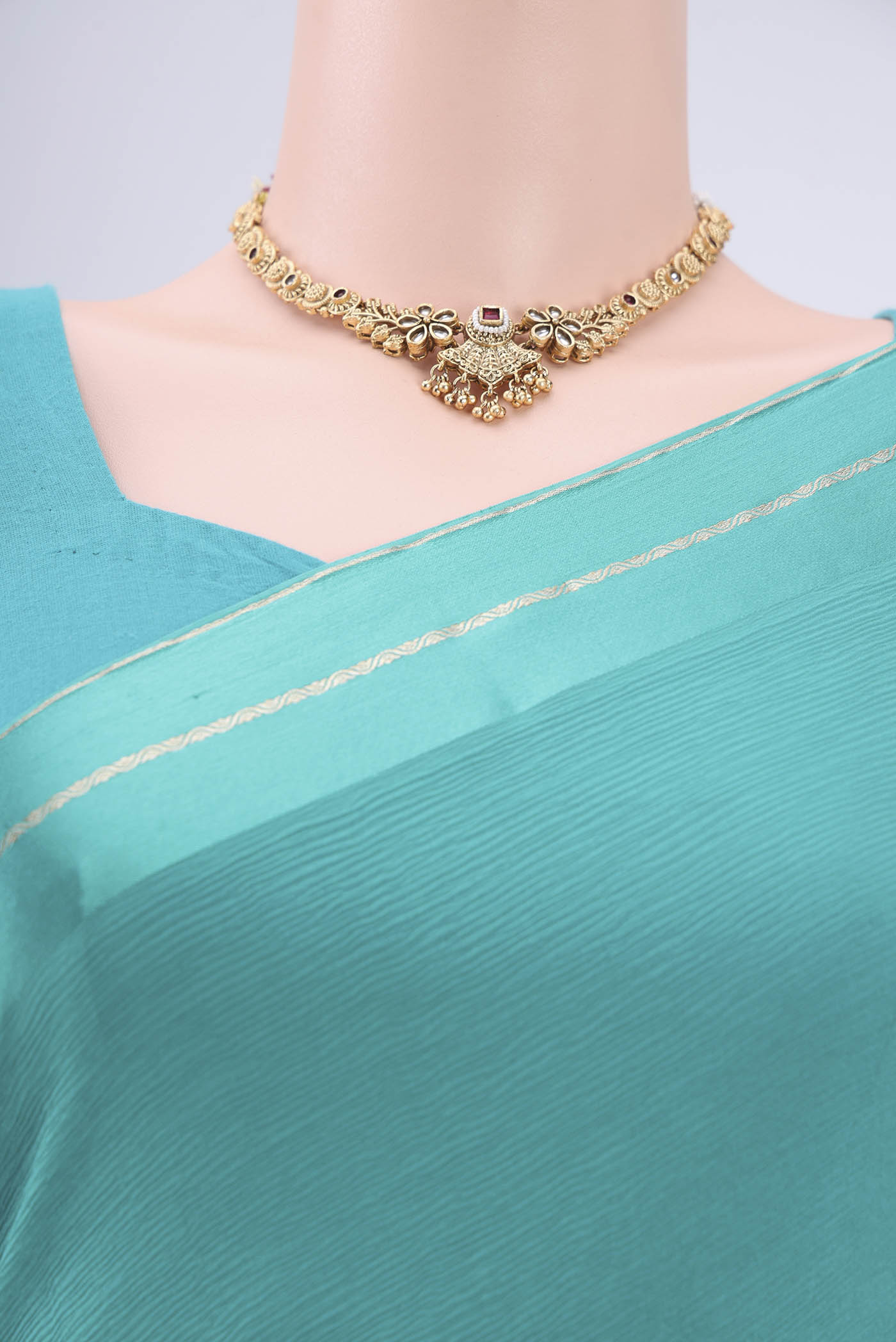 Border image of Turquoise Mysore Chiffon Saree with Plain Body and Satin Border. 