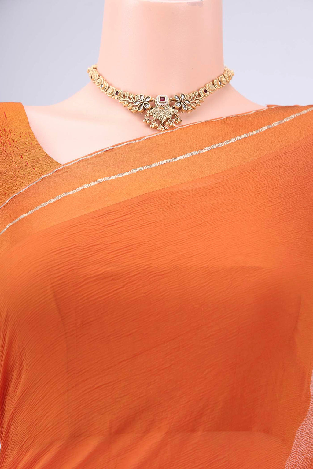 Border image of Rust Mysore Chiffon Saree with Plain Body and Satin Border. 