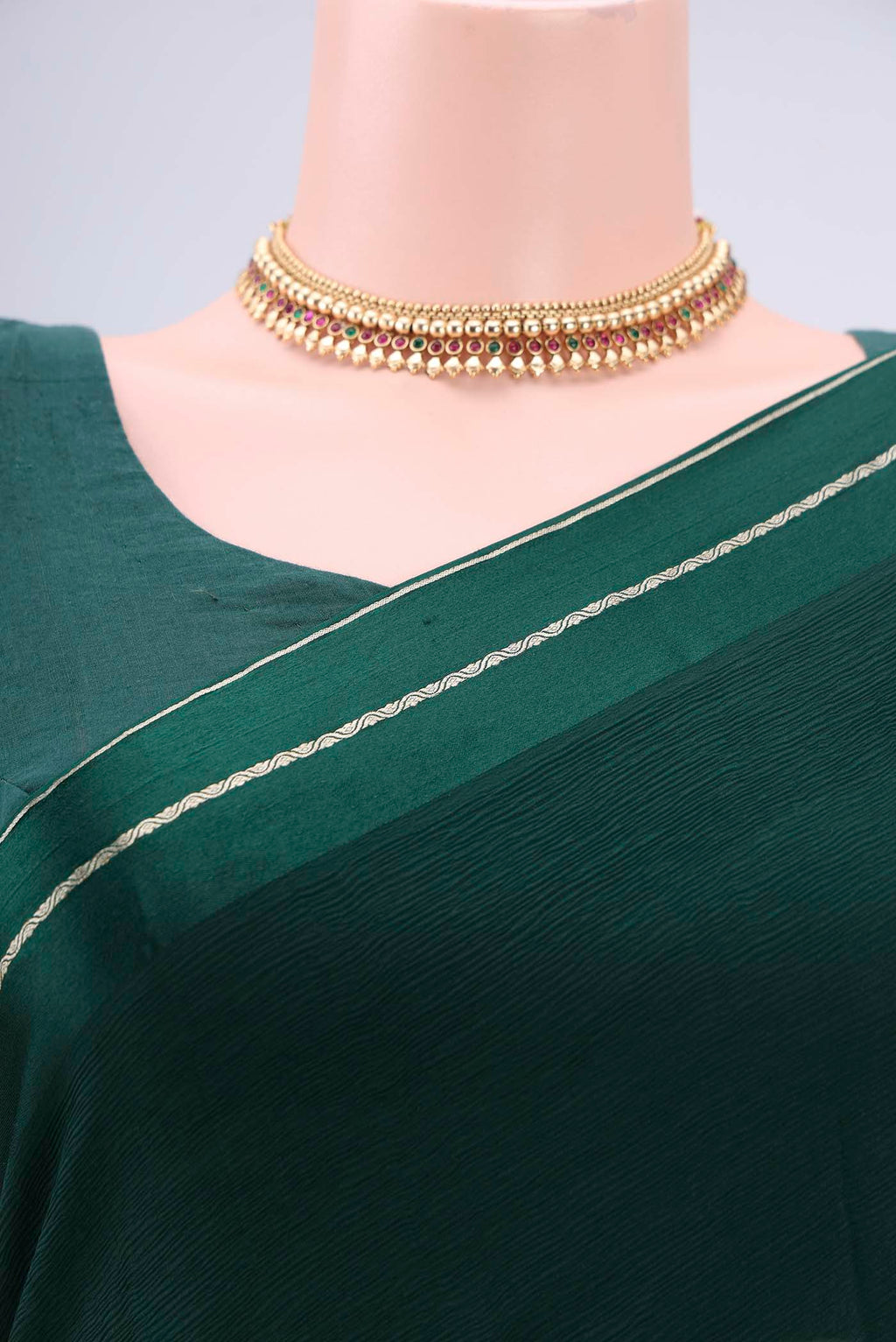Border image of Bottle Green Mysore Chiffon Saree with Plain Body and Satin Border. 