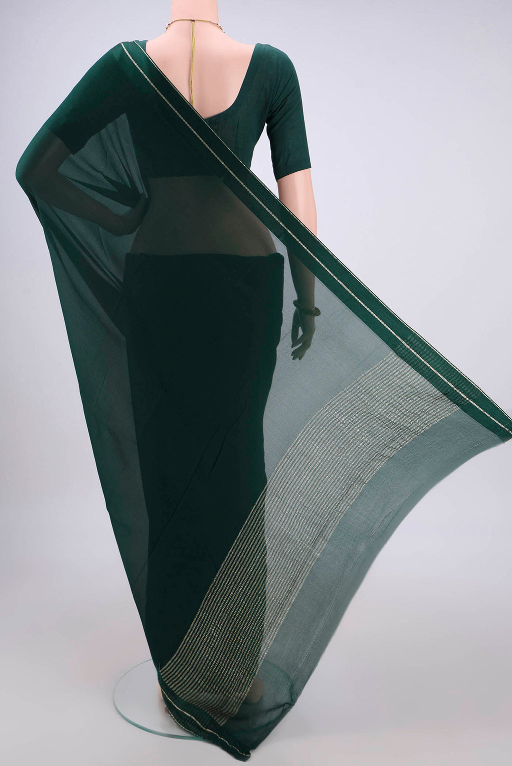 Flat view of Bottle Green Mysore Chiffon Saree with Plain Body and Satin Border. 