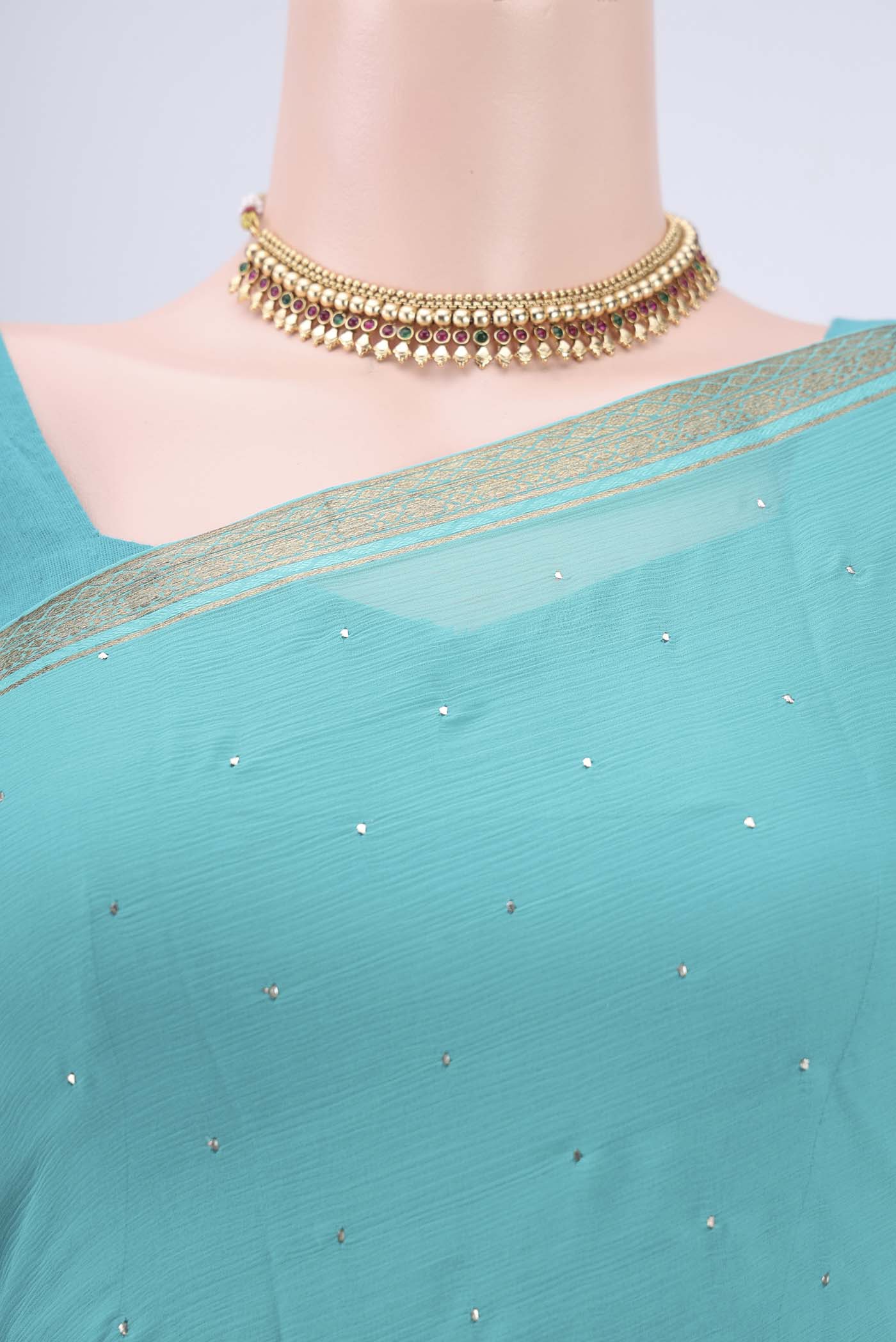 Border image of Turquoise Dual Tone Mysore Chiffon Saree with Embroidery on the body and Zari Border. 