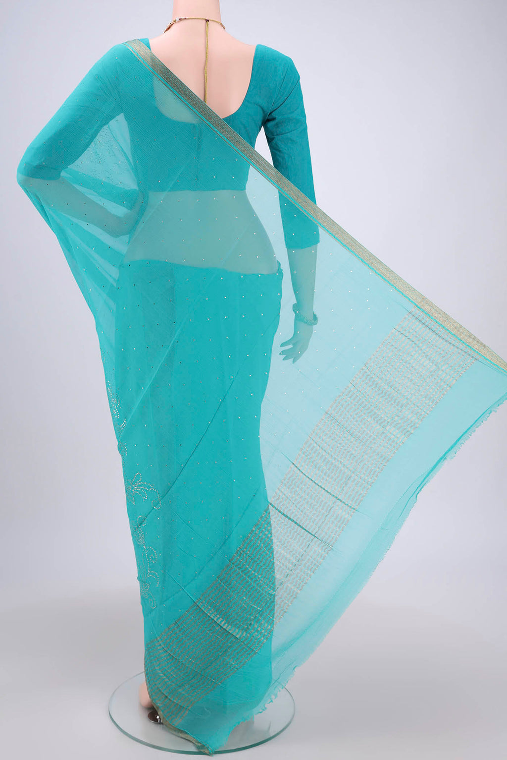 Flat view of Turquoise Dual Tone Mysore Chiffon Saree with Embroidery on the body and Zari Border. 