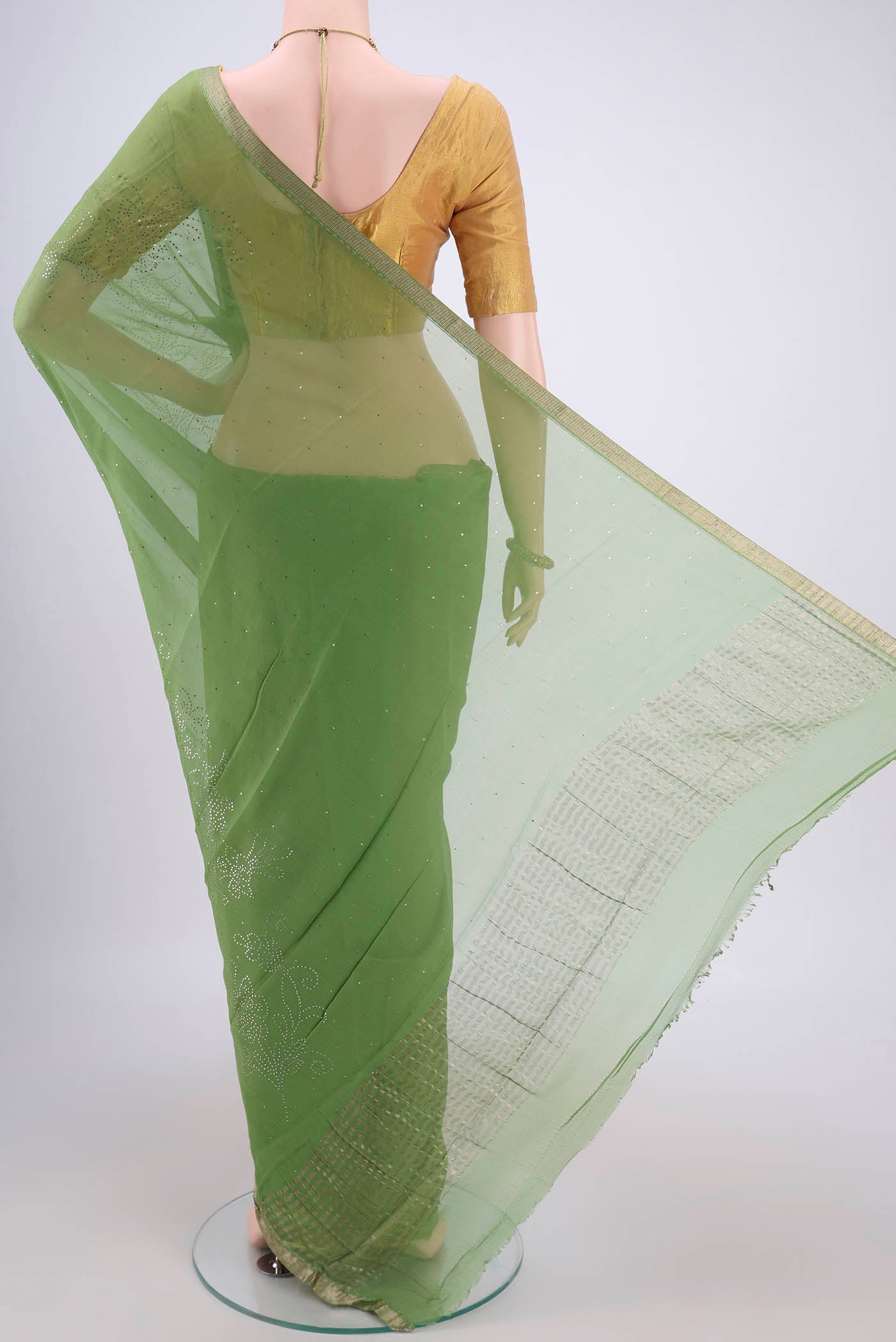 Flat view of Light Green Mysore Chiffon Saree with Embroidery on the body and Zari Border. 