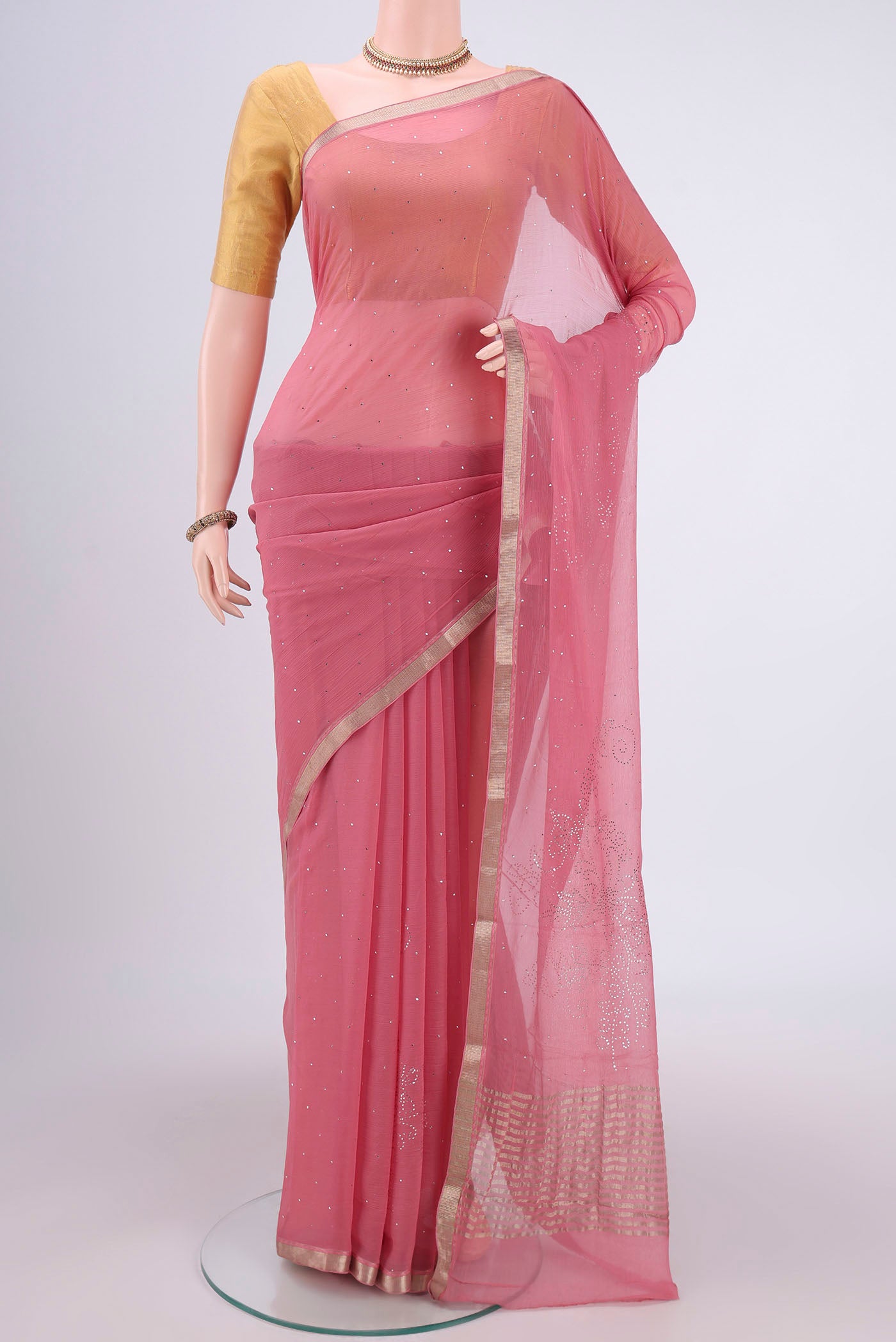 Pink Dual Tone Mysore Chiffon Saree with Embroidery on the body and Zari Border.  displayed on a mannequin