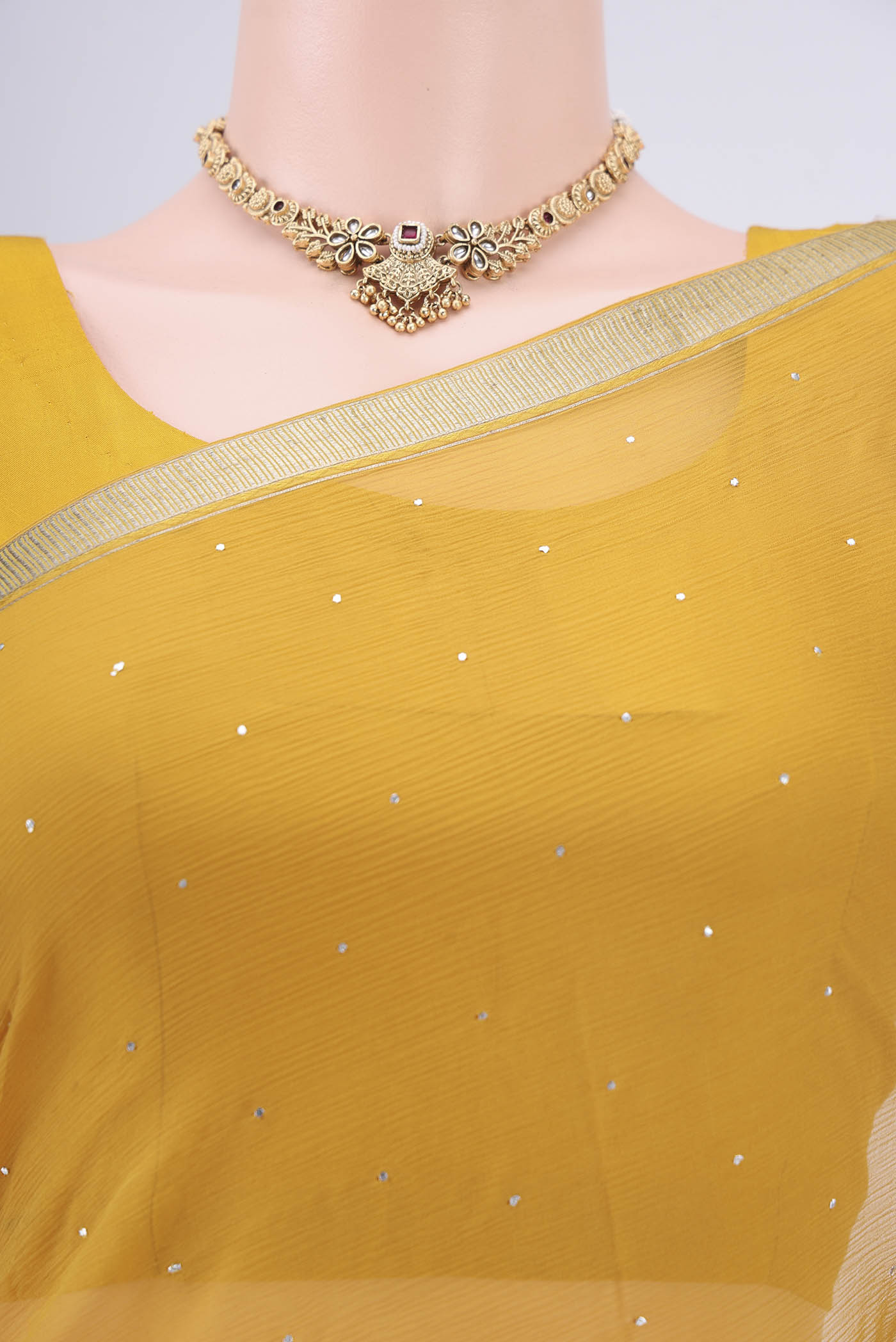 Border image of Yellow Dual Tone Mysore Chiffon Saree with Embroidery on the body and Zari Border. 