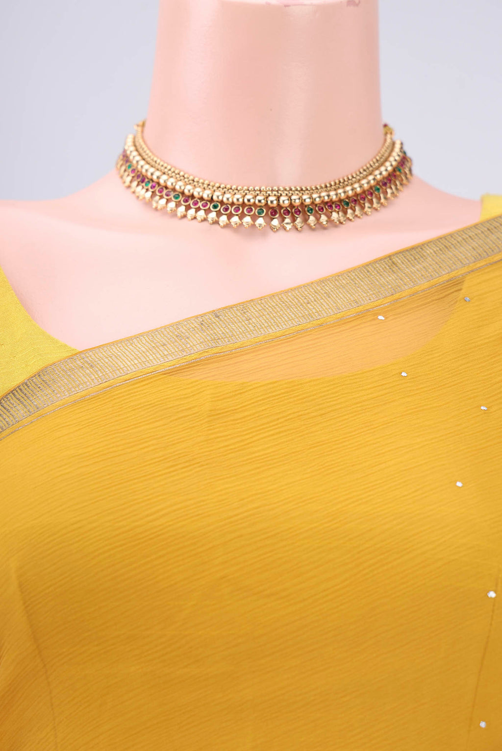 Border image of Mustard Dual Tone Mysore Chiffon Saree with Embroidery on the body and Zari Border. 