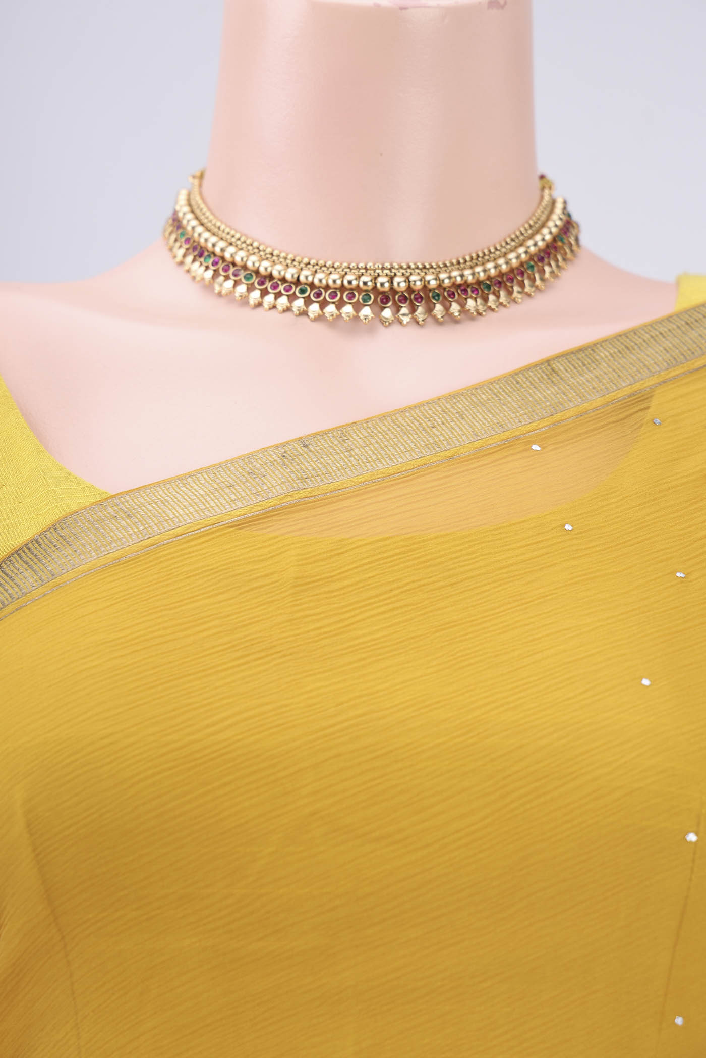 Border image of Mustard Dual Tone Mysore Chiffon Saree with Embroidery on the body and Zari Border. 