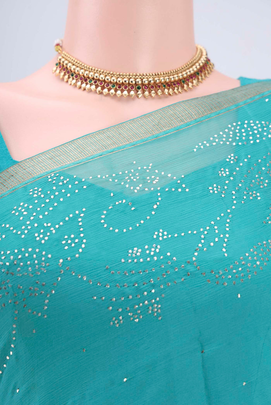 Border image of Turquoise Dual Tone Mysore Chiffon Saree with Embroidery on the body and Zari Border. 