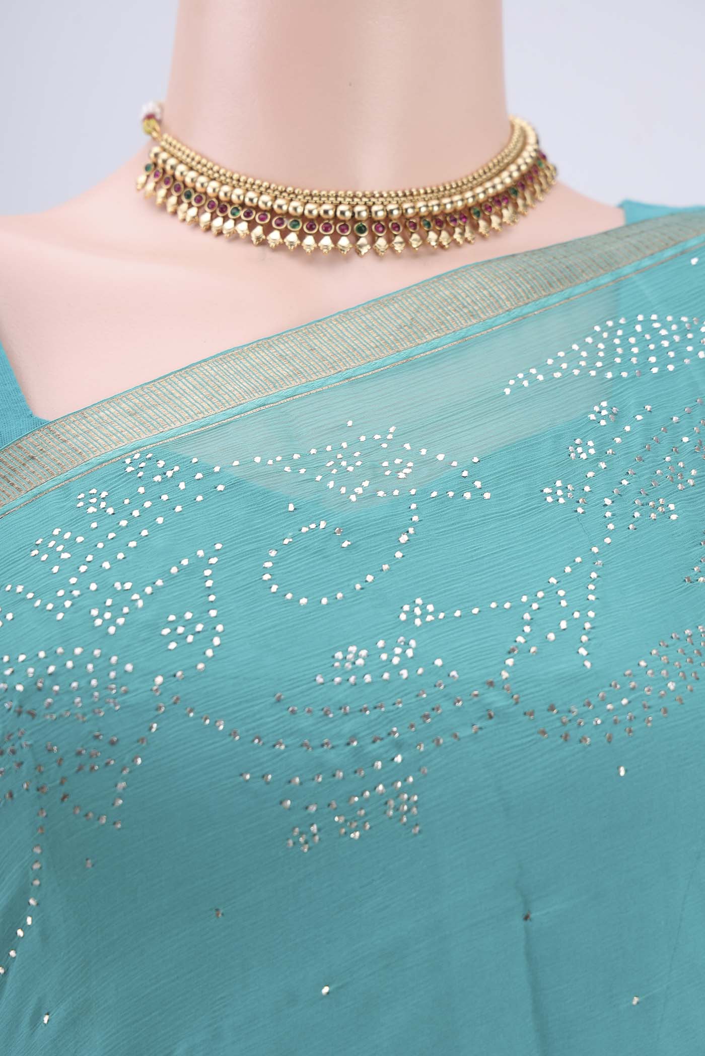 Border image of Turquoise Dual Tone Mysore Chiffon Saree with Embroidery on the body and Zari Border. 