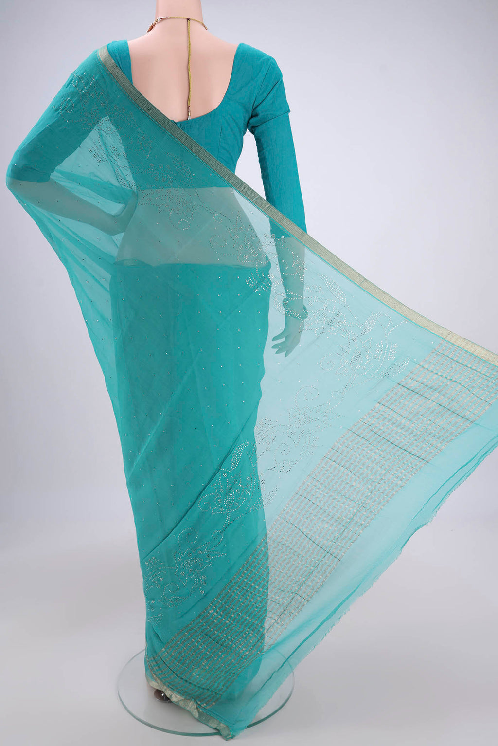 Flat view of Turquoise Dual Tone Mysore Chiffon Saree with Embroidery on the body and Zari Border. 
