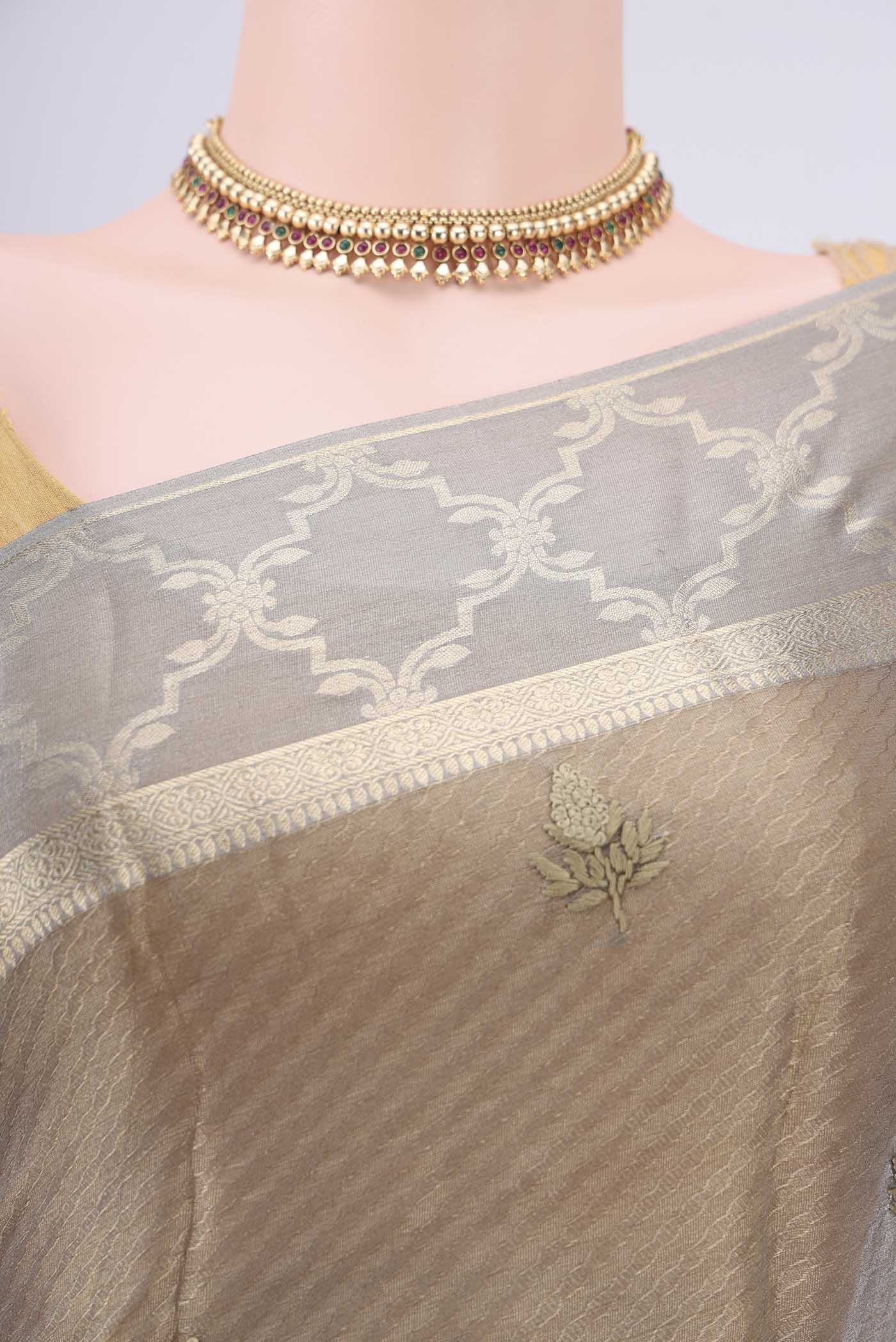 Border image of Davys Grey Mysore Georgette Saree with Embroidery on the body and Zari Border. 