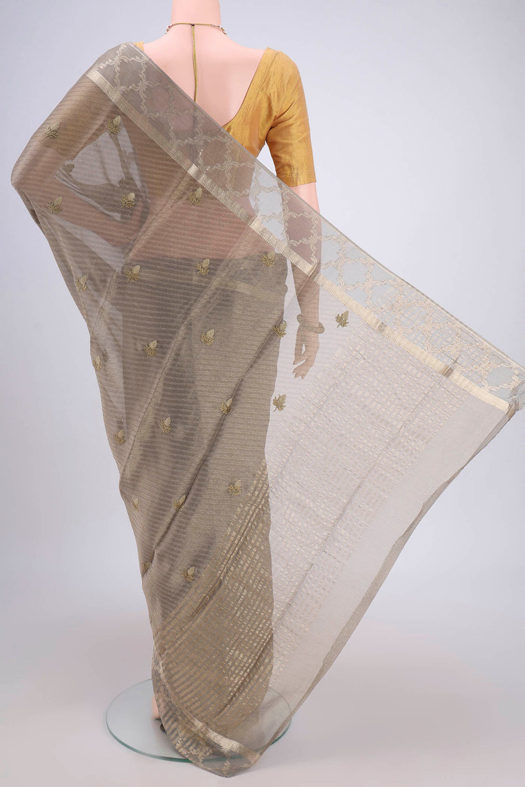 Flat view of Davys Grey Mysore Georgette Saree with Embroidery on the body and Zari Border. 
