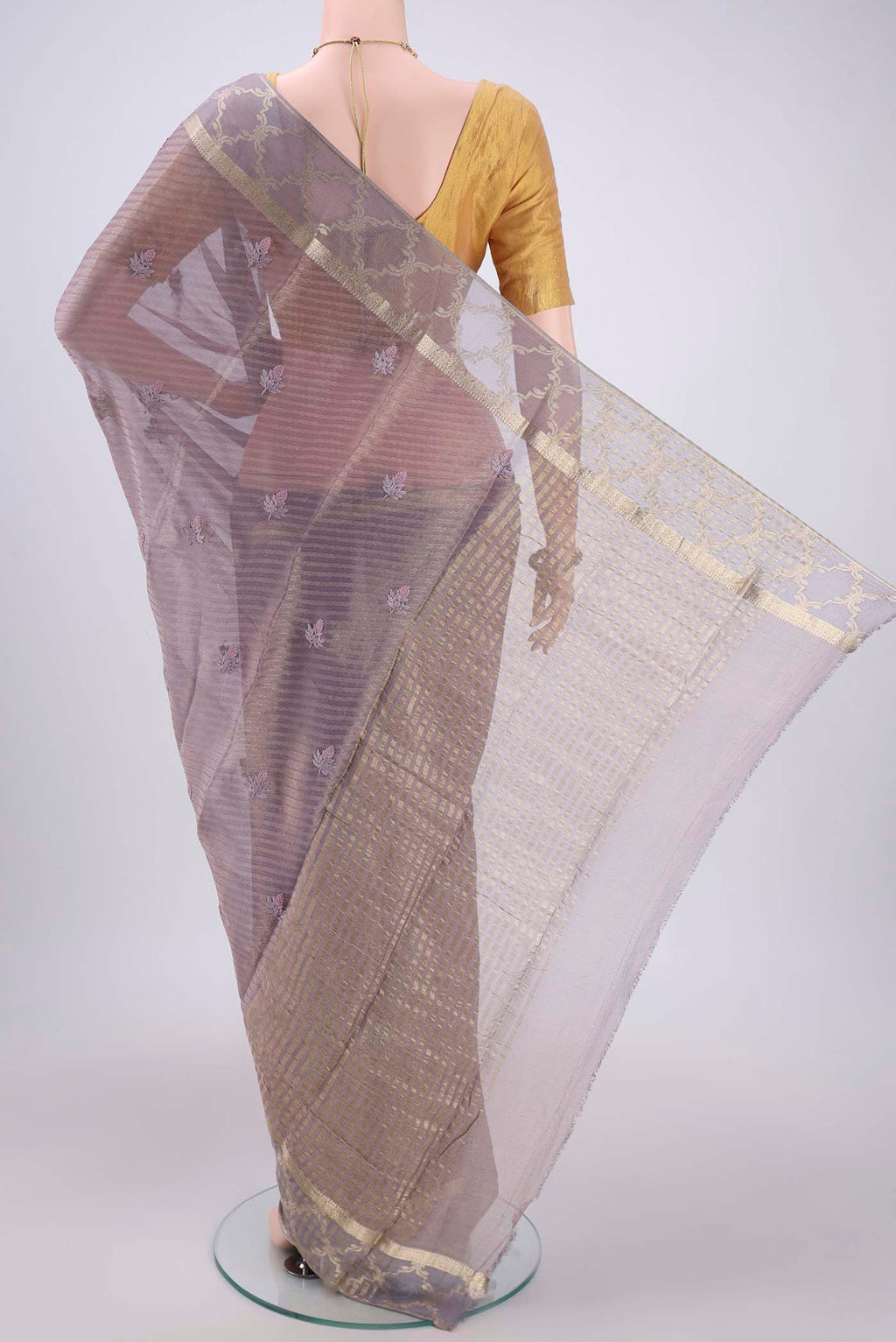 Flat view of Mauve Mysore Georgette Saree with Embroidery on the body and Zari Border. 