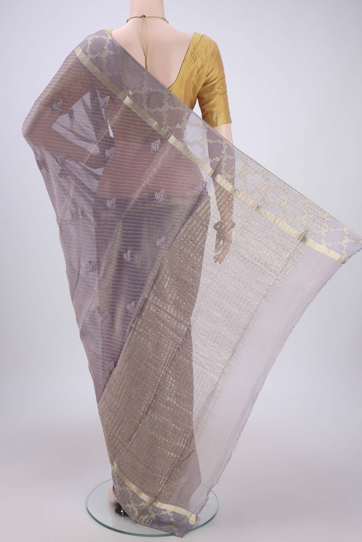 Flat view of Mauve Mysore Georgette Saree with Embroidery on the body and Zari Border. 