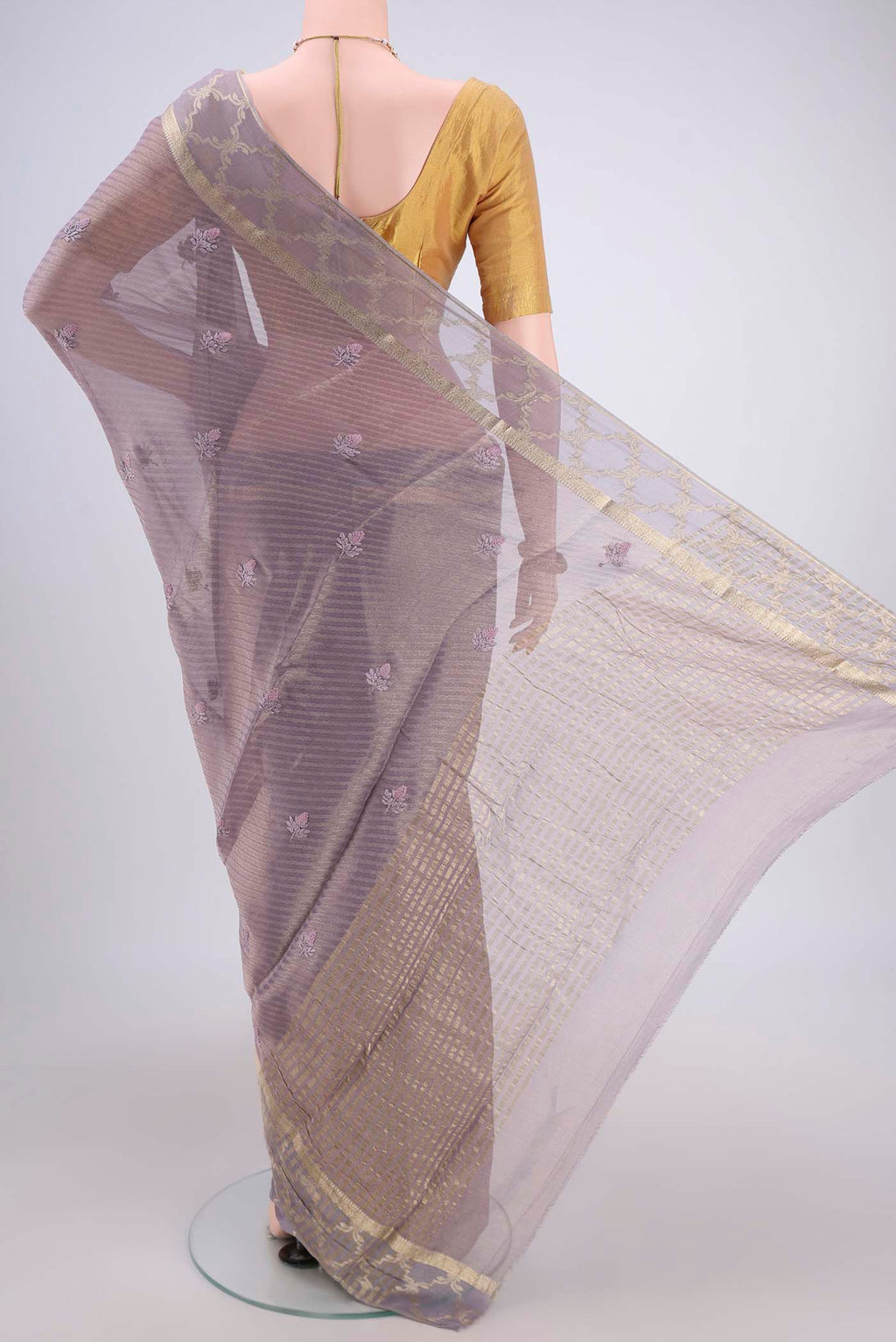 Flat view of Lavender Mysore Georgette Saree with Embroidery on the body and Zari Border. 