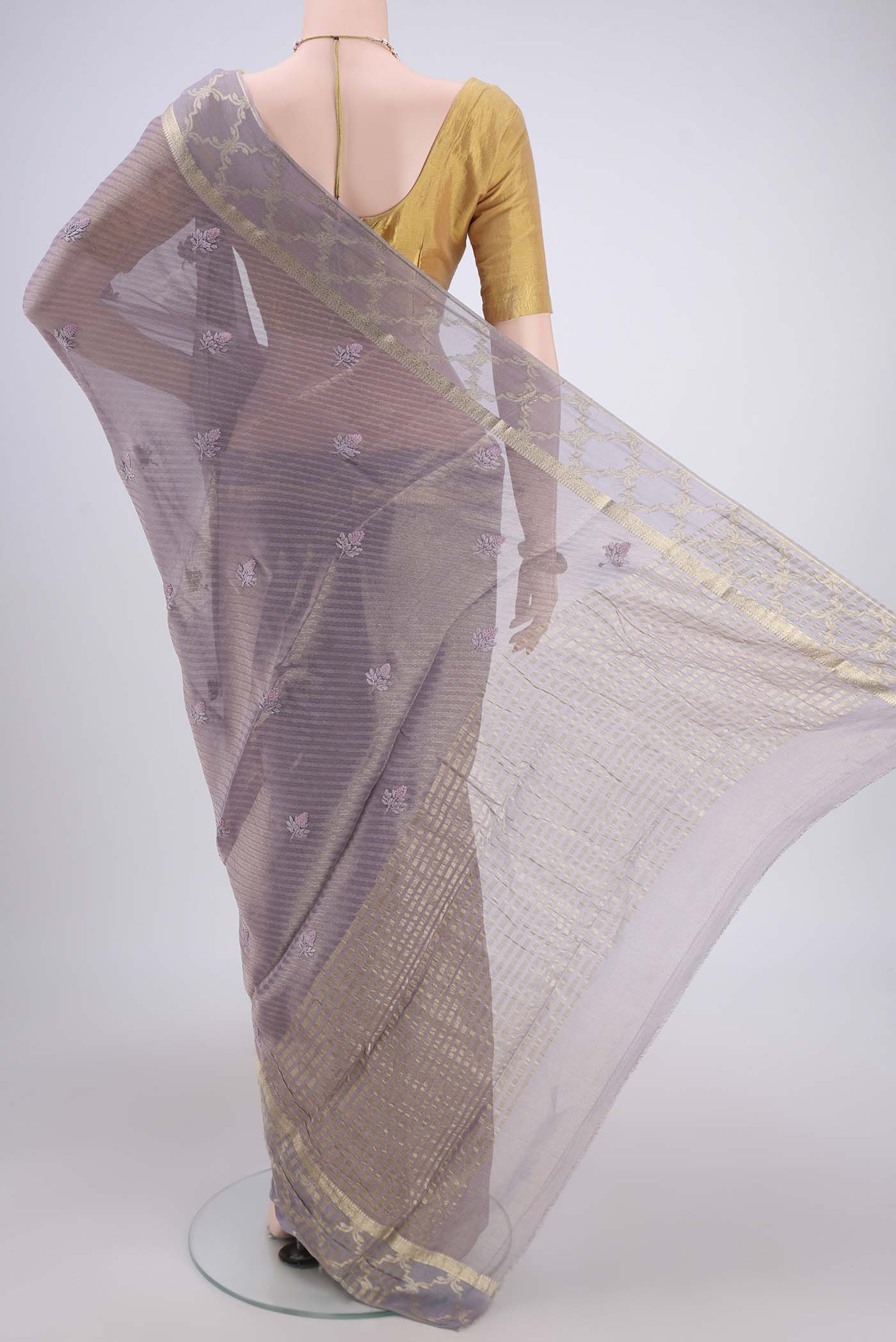 Flat view of Lavender Mysore Georgette Saree with Embroidery on the body and Zari Border. 
